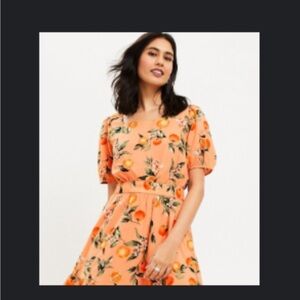 Orange open back cropped top